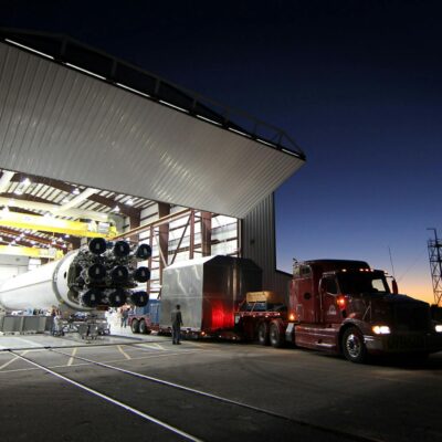 Photo by SpaceX Truck parked near hangar in rocket factory